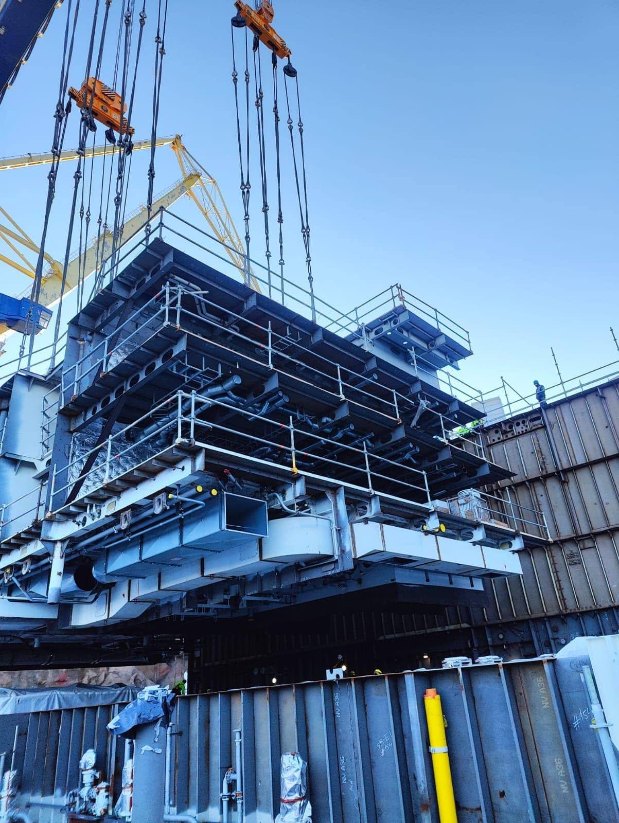 Hull block lifted by crane