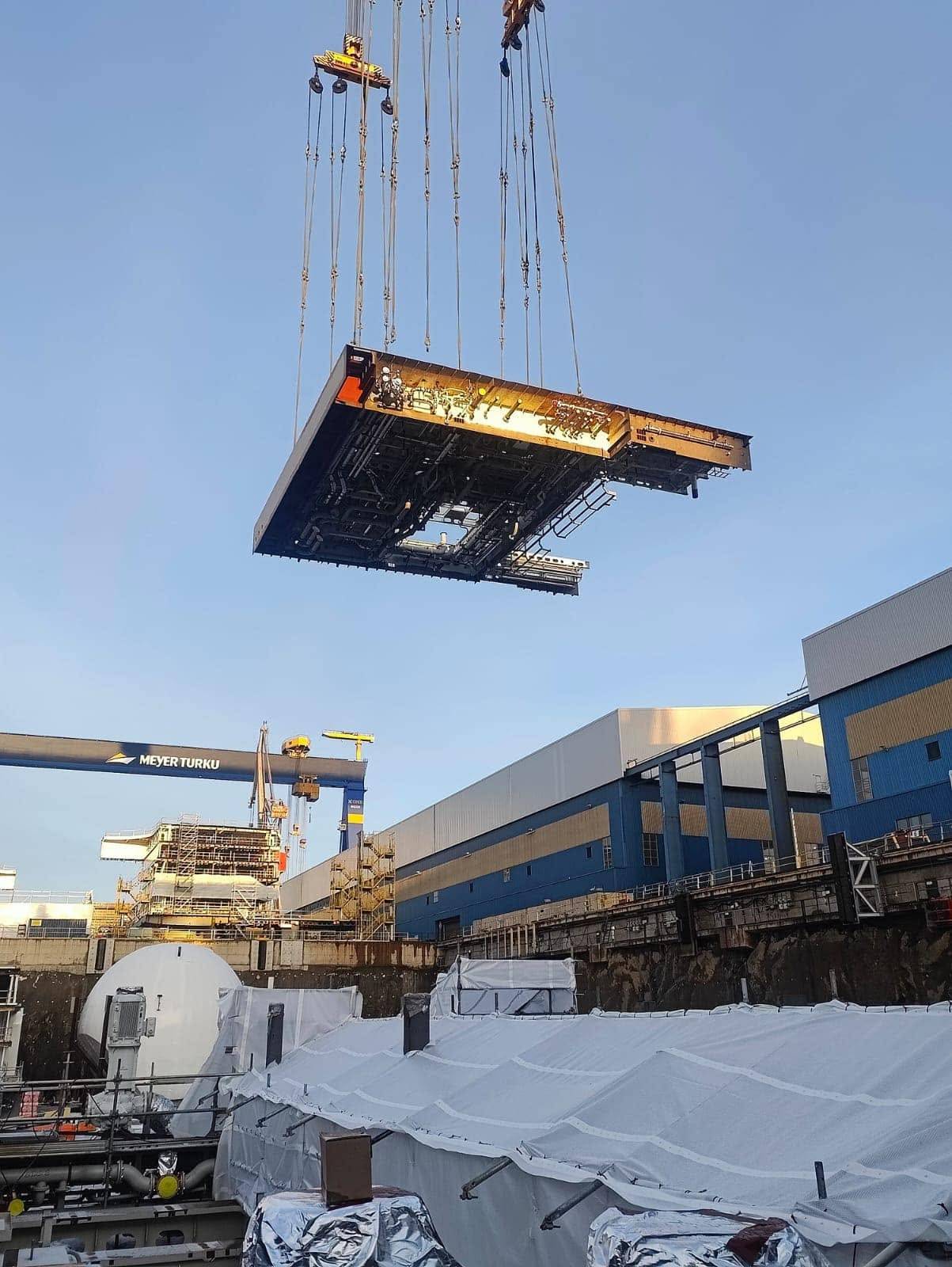 Deck block lifted into place