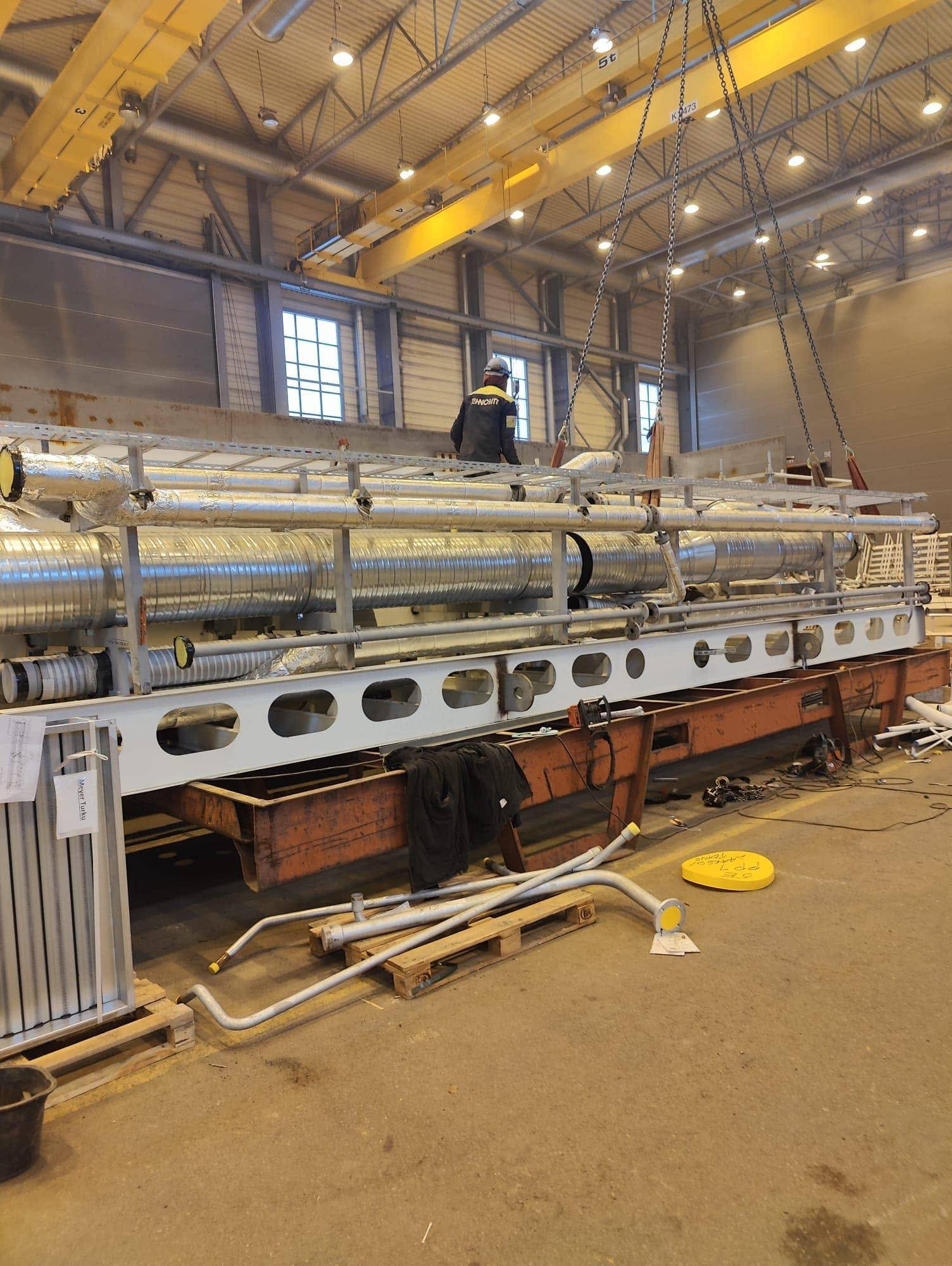 Pipe module in assembly with welded pipework